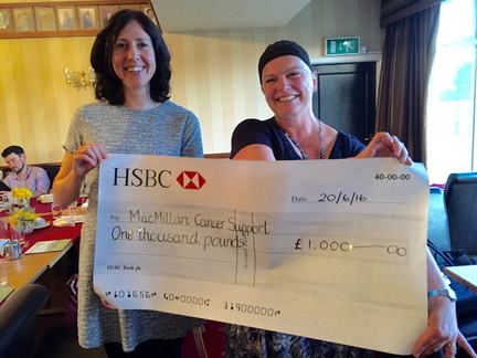Cheque to MacMillan Cancer Support 
